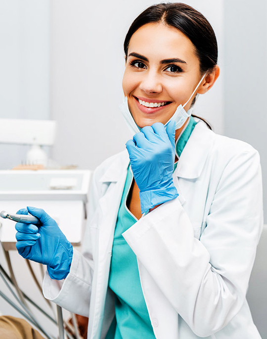 Friendly dentist providing gentle pediatric dental care for kids and children.